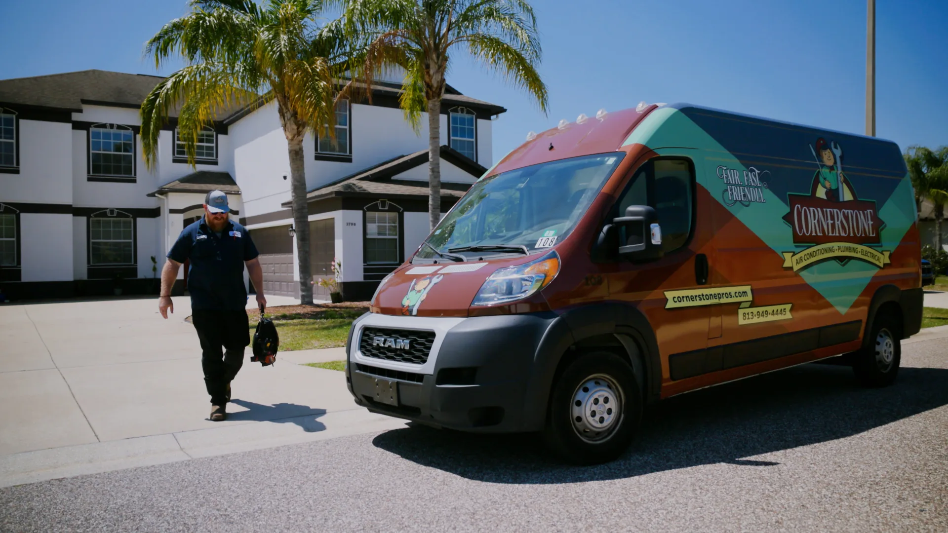 Cornerstone Pros technician and service van at a Tampa Bay home